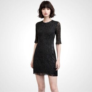 Diane Von Furstenburg Lace Dress with Silk Side Panels and trim in Black Size 2